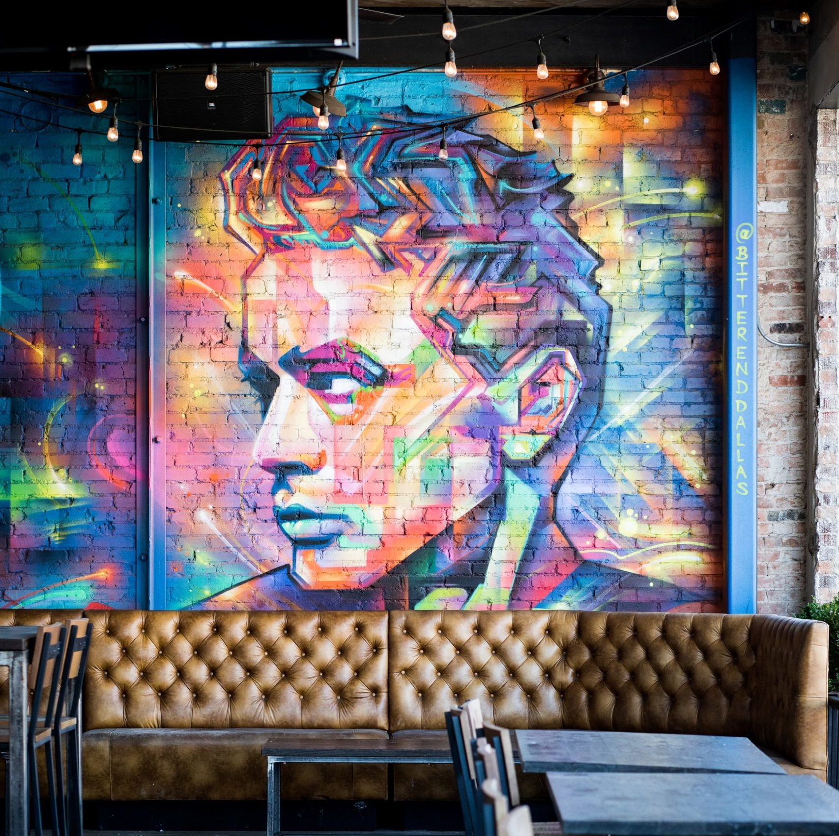 Deep Ellum mural showing a man's face