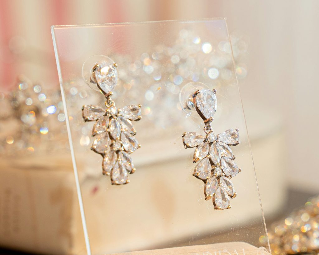 Close up of diamond earrings on display