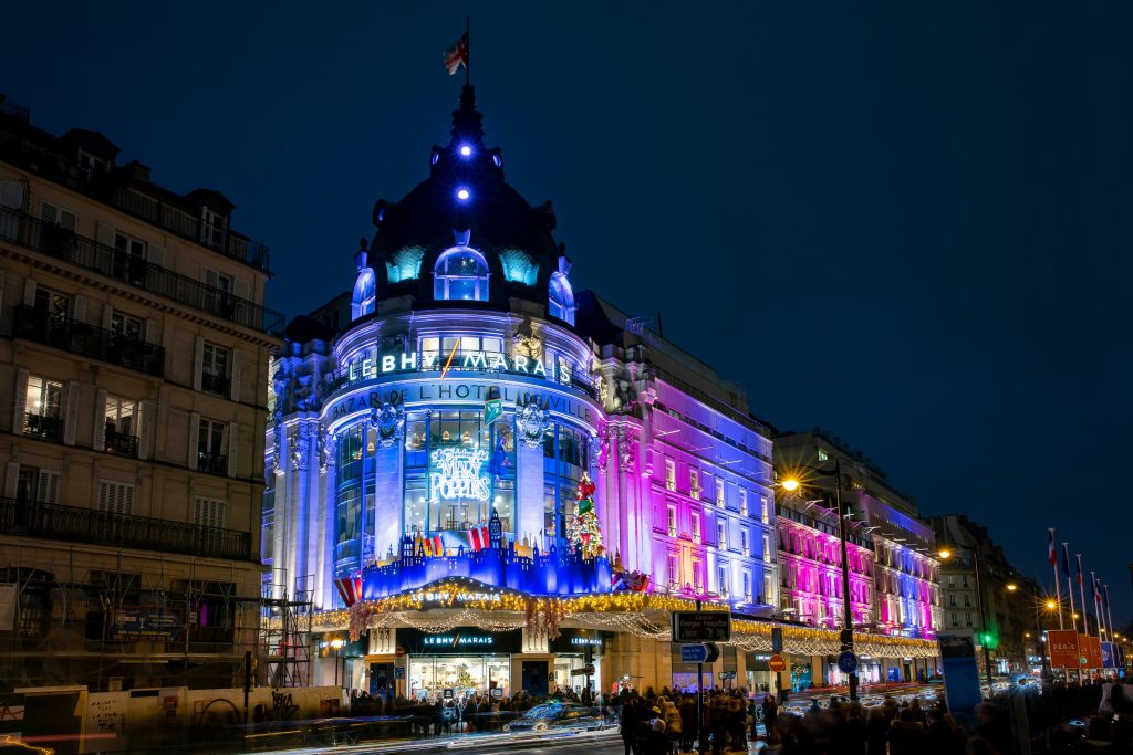Le BHV Marais building lit up in the evening in Paris 