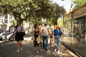 Guide walking with group during Barcelona Architecture Tour
