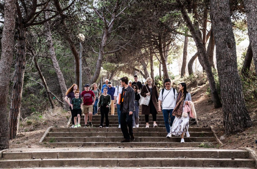 Montjuic tour with guests walking down stairs