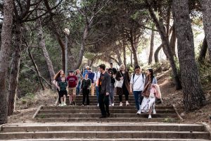 Montjuic tour with guests walking down stairs