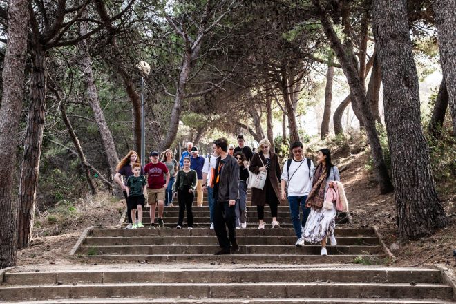 Montjuic tour with guests walking down stairs
