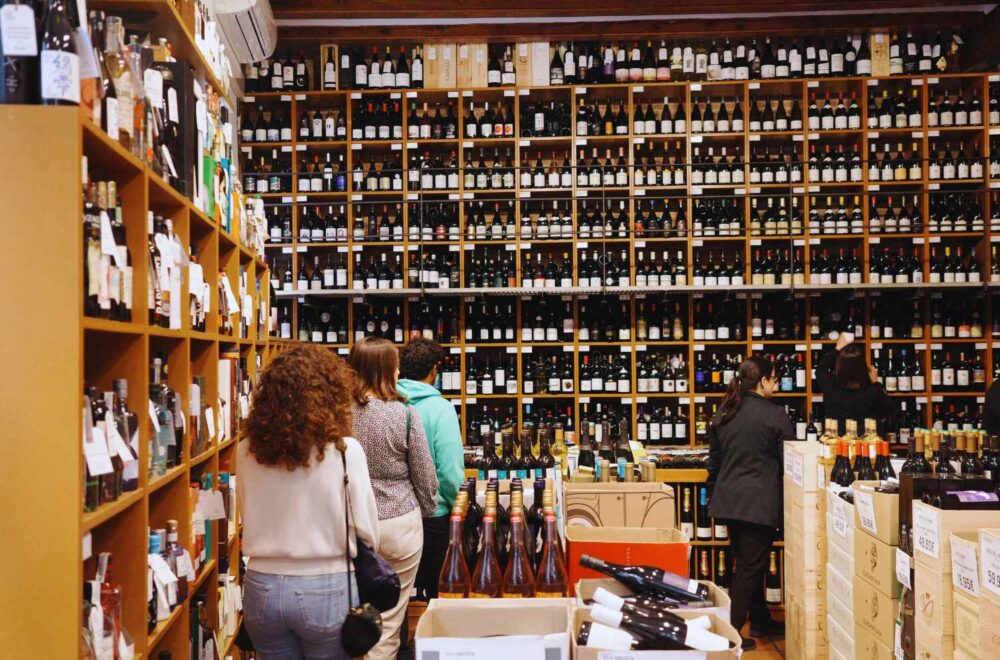 Guests browsing wine in Vila Vini Teca Store in Barcelona