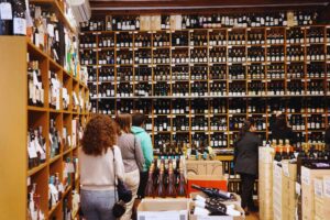 Guests browsing wine in Vila Vini Teca Store in Barcelona