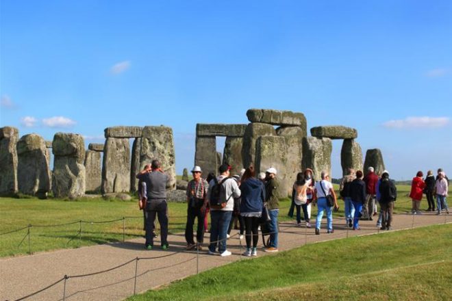 People taking pictures at Stonehenge