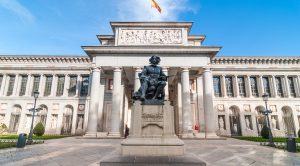 Clear sky and warm day for a visit to The Prado Museum. Front entrance and terrace to the Museo del Prado, Spanish national art museum, located in central Madrid.