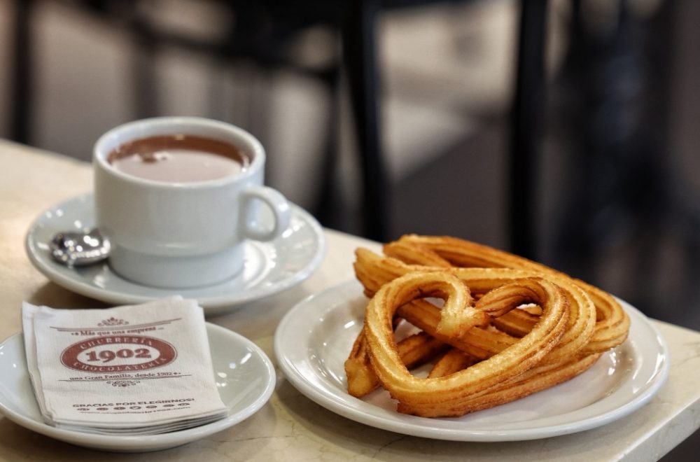 Churros and hot chocolate at Chocolatería 1902 in Madrid