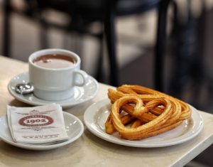 Churros and hot chocolate at Chocolatería 1902 in Madrid