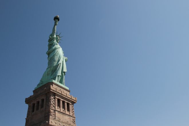 Low-angle shot of Statue of Liberty during the day
