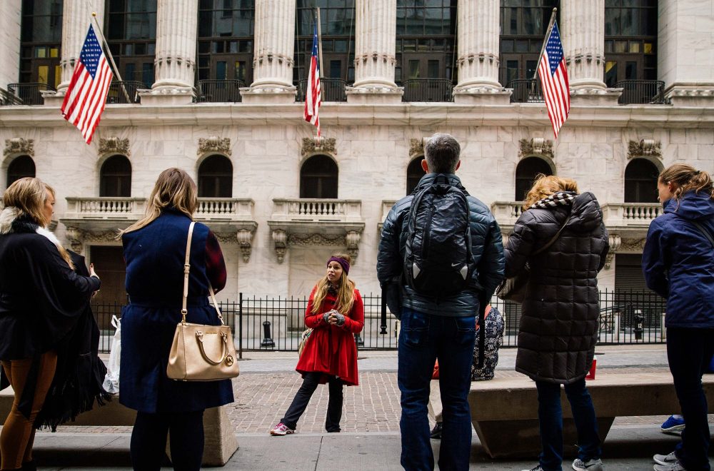 guide in lower Manhattan with NYC tour group