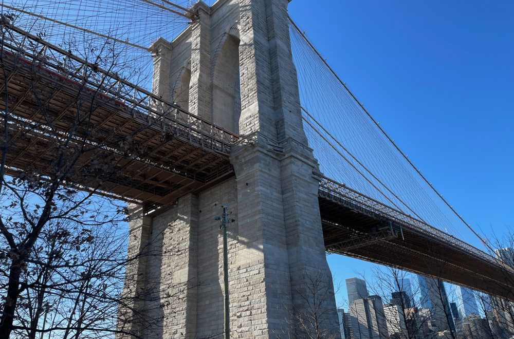 Side view of Manhattan Bridge on a sunny day in NYC