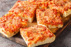 Close up of Sfincione pizza during Food and Culture Dumbo Walking Tour in NYC