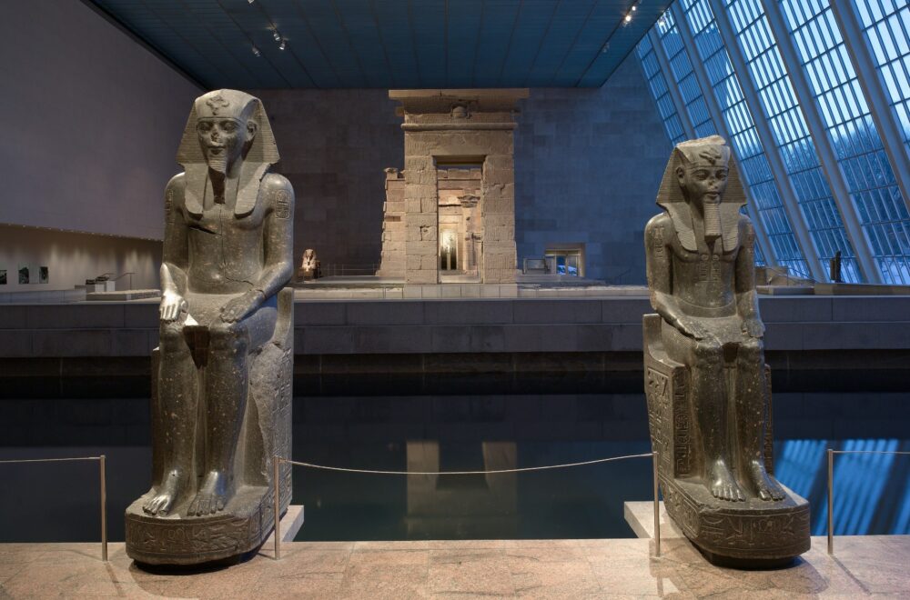 Two statues of Amenhotep III in the Temple of Dendur in the Met NYC