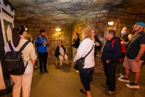 Guide and Group during Catacombs Guided Tour