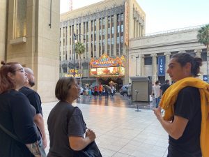 Tour guide talking with guests on the ExperienceFirst Haunted Hollywood Walking Tour
