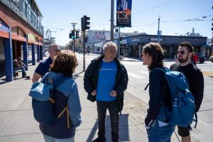 Guide explaining to group during guided tour in San Francisco