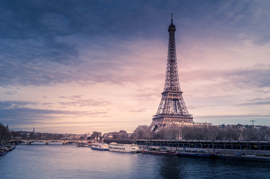 Eiffel Tower seen over the river from a distance
