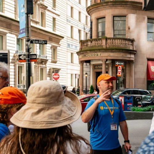 Succession tour group with guide in NYC on walking tour