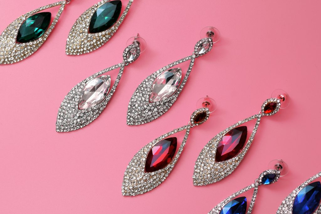 Pairs of silver earrings with gemstones